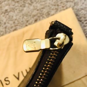 LOUIS VUITTON POCHETTE-made in PARIS. Authentic.